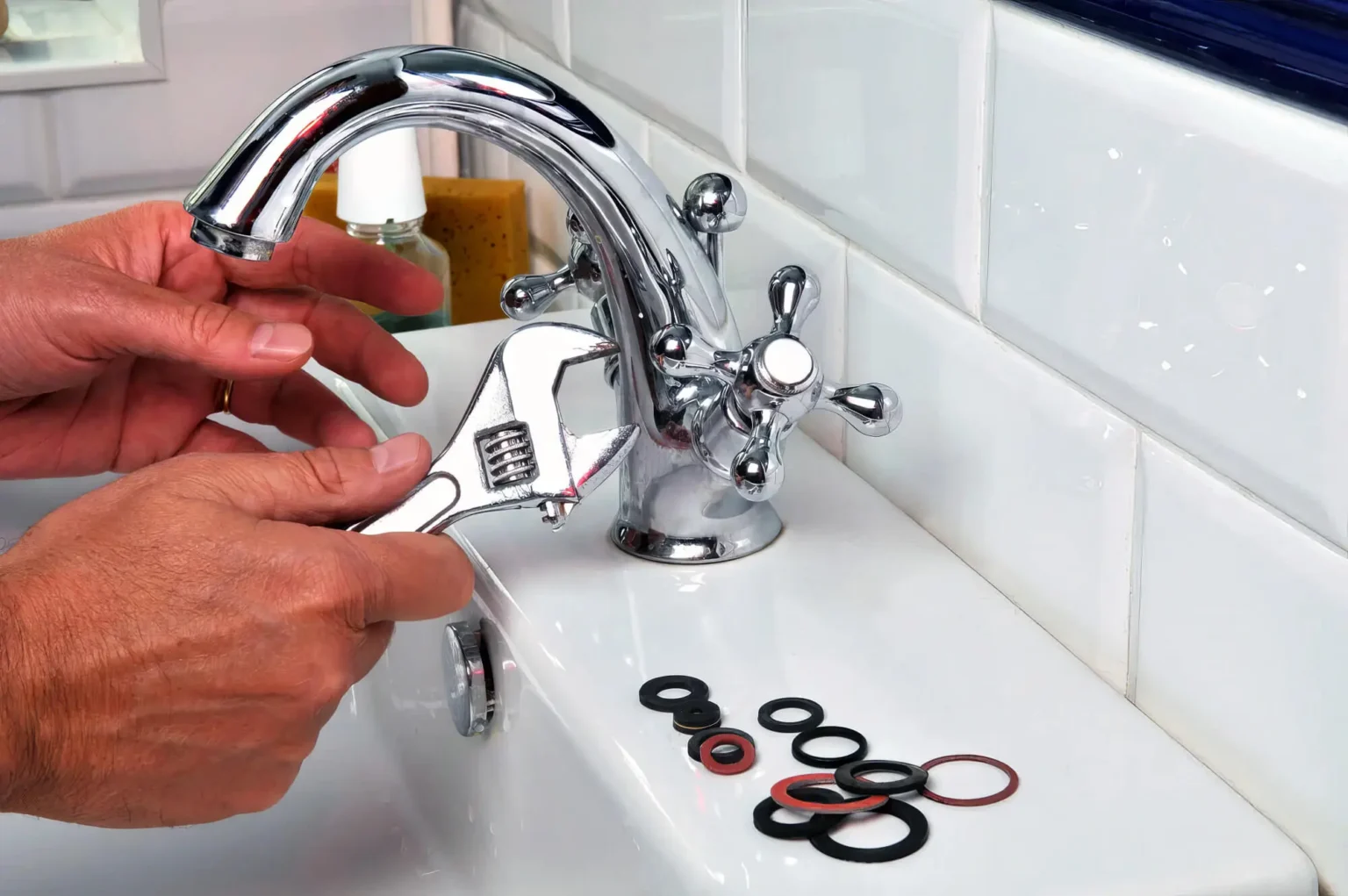 Plumber maintaining a bathroom faucet in Moorpark