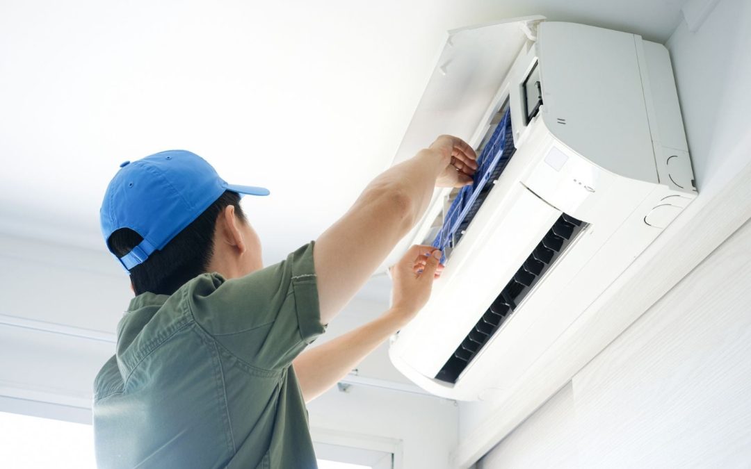 HVAC technician servicing a ductless mini split in Moorpark